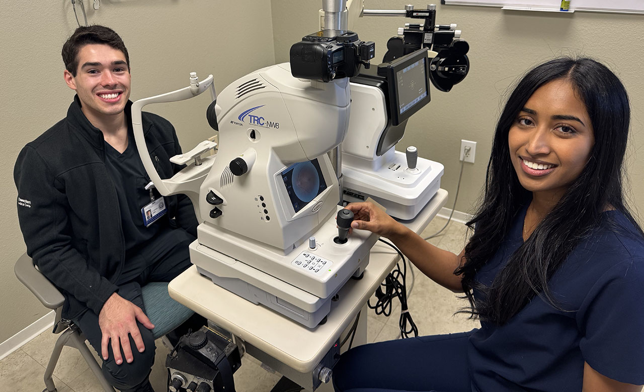 Students with eye examination equipment
