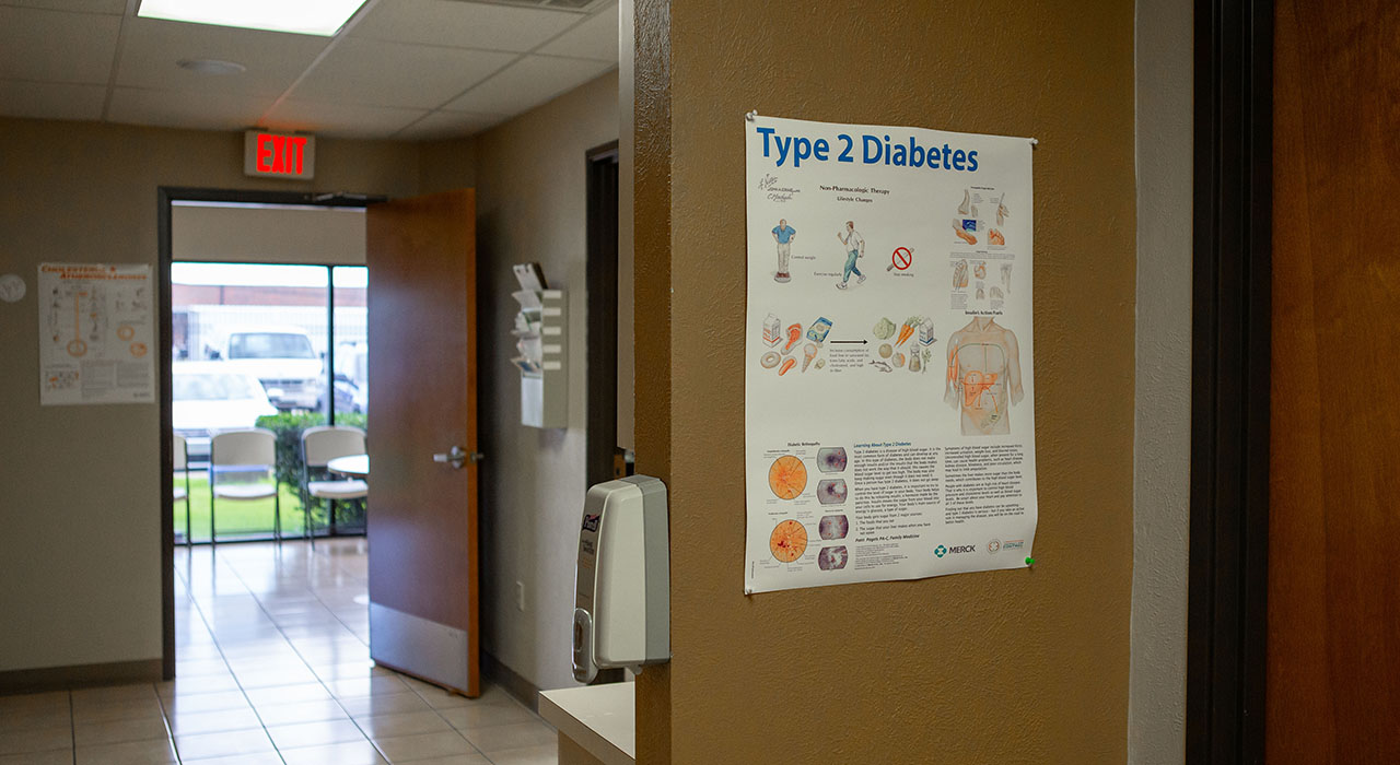 Clinic interior at Calvert Place showing flyer about diabetes