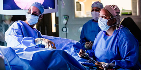 A photo of surgeons performing surgery