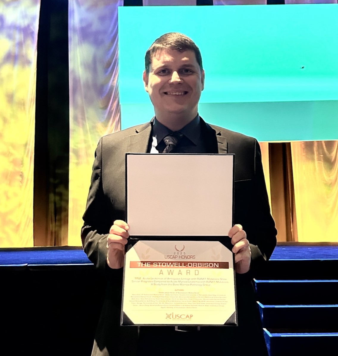  Dr. Tim Kirtek  with Award