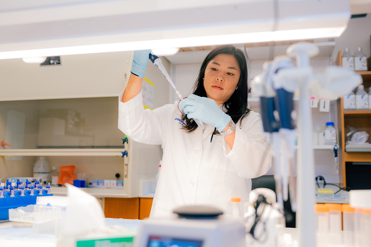 Dr. Lee pipetting