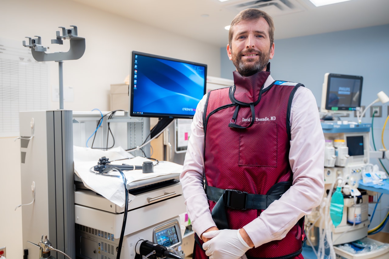 Dr. David M. Troendle in a room with medical equipment
