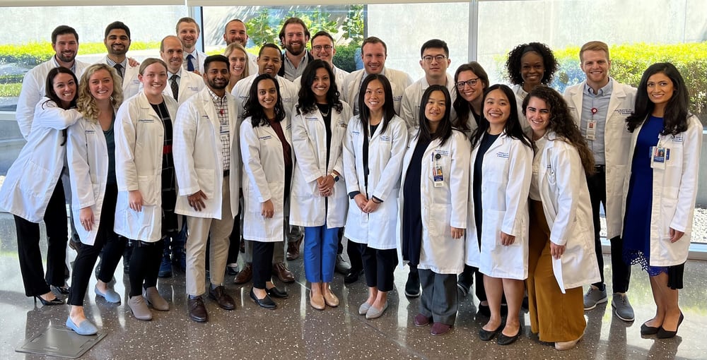 a group of medical students in white coats