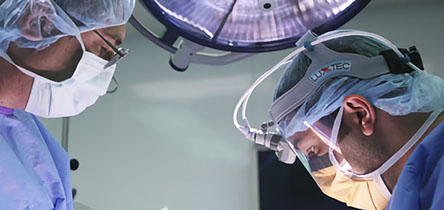 two surgeons in masks