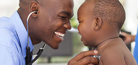 doctor smiling at baby