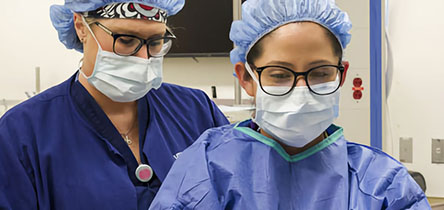 two surgeons in masks
