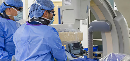 two surgeons in masks