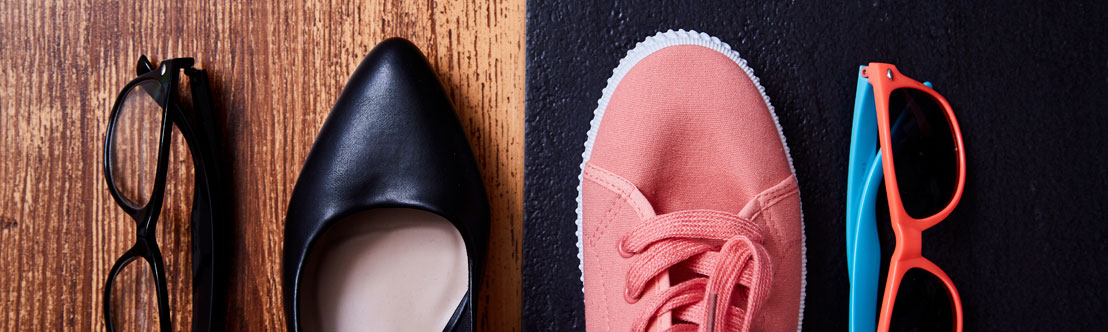 An image showing a black dress shoe next to a black pair of glasses on a woodgrain background, and a pink sneaker next to a colorful pair of sunglasses on a black background
