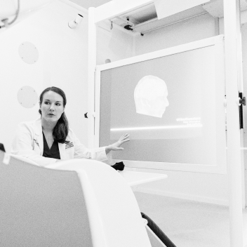 Dr. Davenport speaking and teaching in a classroom