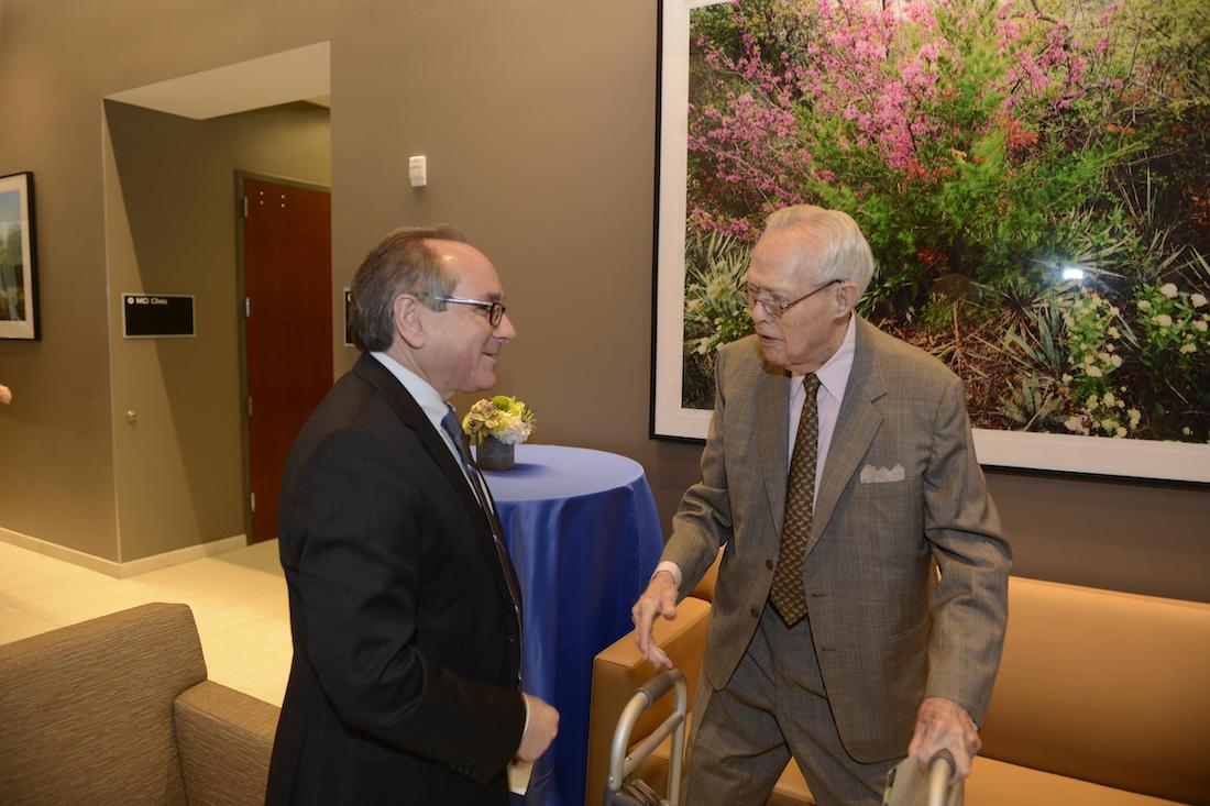 Photo of Dr. Daniel K. Podolsky, President of UT Southwestern, left, visits with W.A. &ldquo;Tex&rdquo; Moncrief Jr. at the opening in 2015 of the Monty and Tex Moncrief Medical Center at Fort Worth 