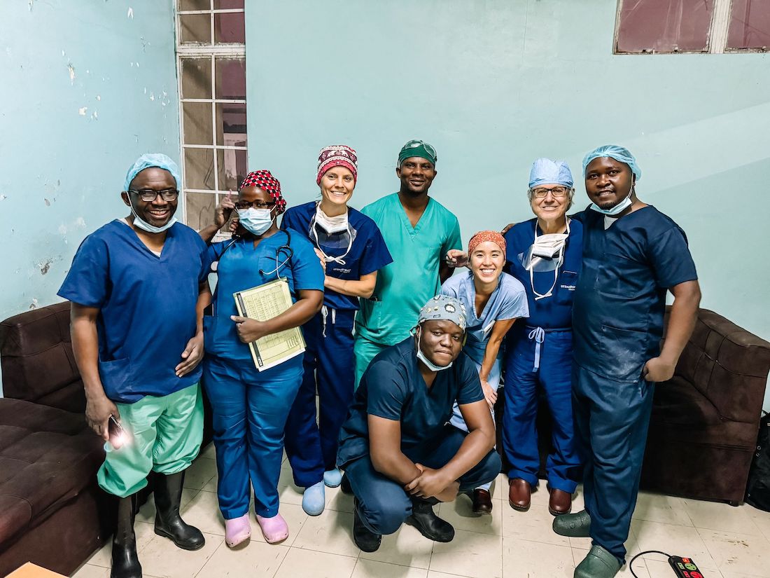 Roger Bedimo, M.D., (left), Director of UTSW&rsquo;s Office of Global Health, and Joseph Schaffer, M.D., (second from right), with colleagues