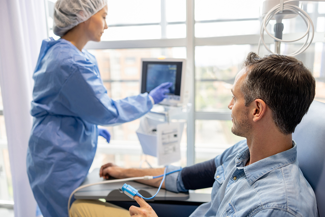Nurse checking the vital signs of a patient at the hospital during a medical exam