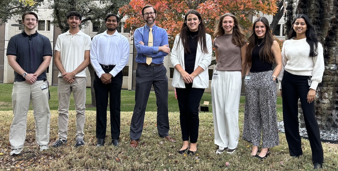 Dr. Tatara (center) and members of his UT&nbsp;Southwestern lab