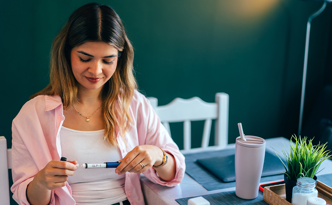 Young woman preparing Glp1 injection at home