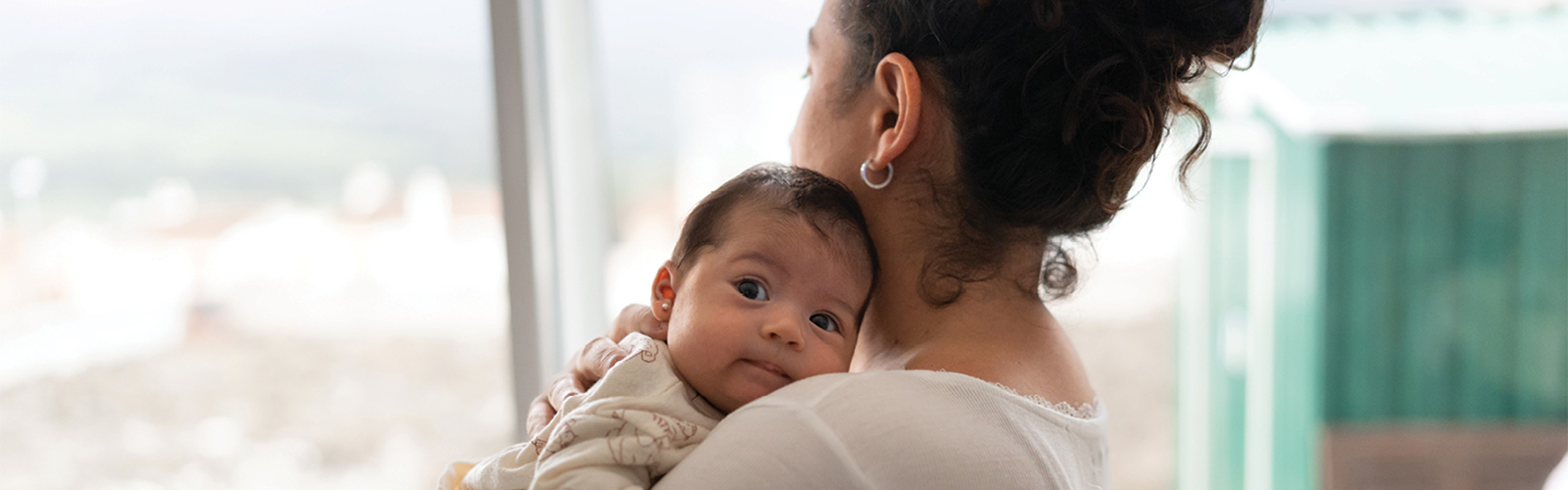 mother holding her infant child